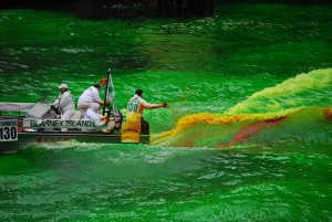 Dyeing the Chicago River with orange powder that turns green